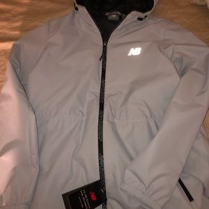 Brand new Windbreaker jacket with hood